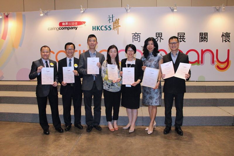 NWS Holdings and 10 member companies awarded Caring Company Logo